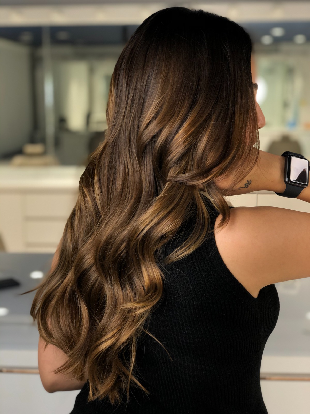Dimensional balayage waves after a hair colour service
